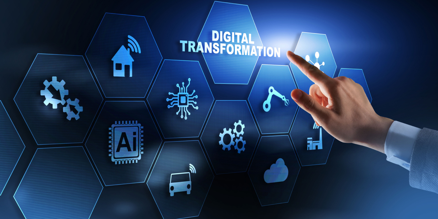 An expert operates a virtual screen with icons that illustrate digital transformation.